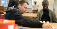 Two men sat at table