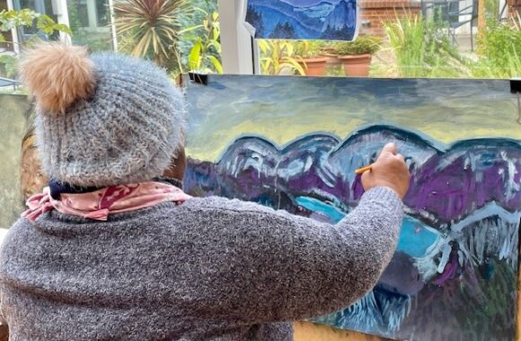 A Look Ahead resident painting a meaningful piece of art to be displayed at the Bit by bit exhibition.